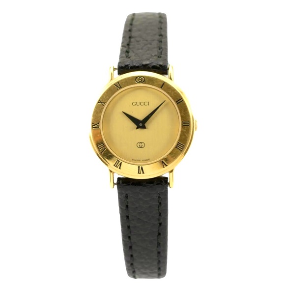 Gucci Women's Luxurious Gold and Black Watch - Picture 1 of 14